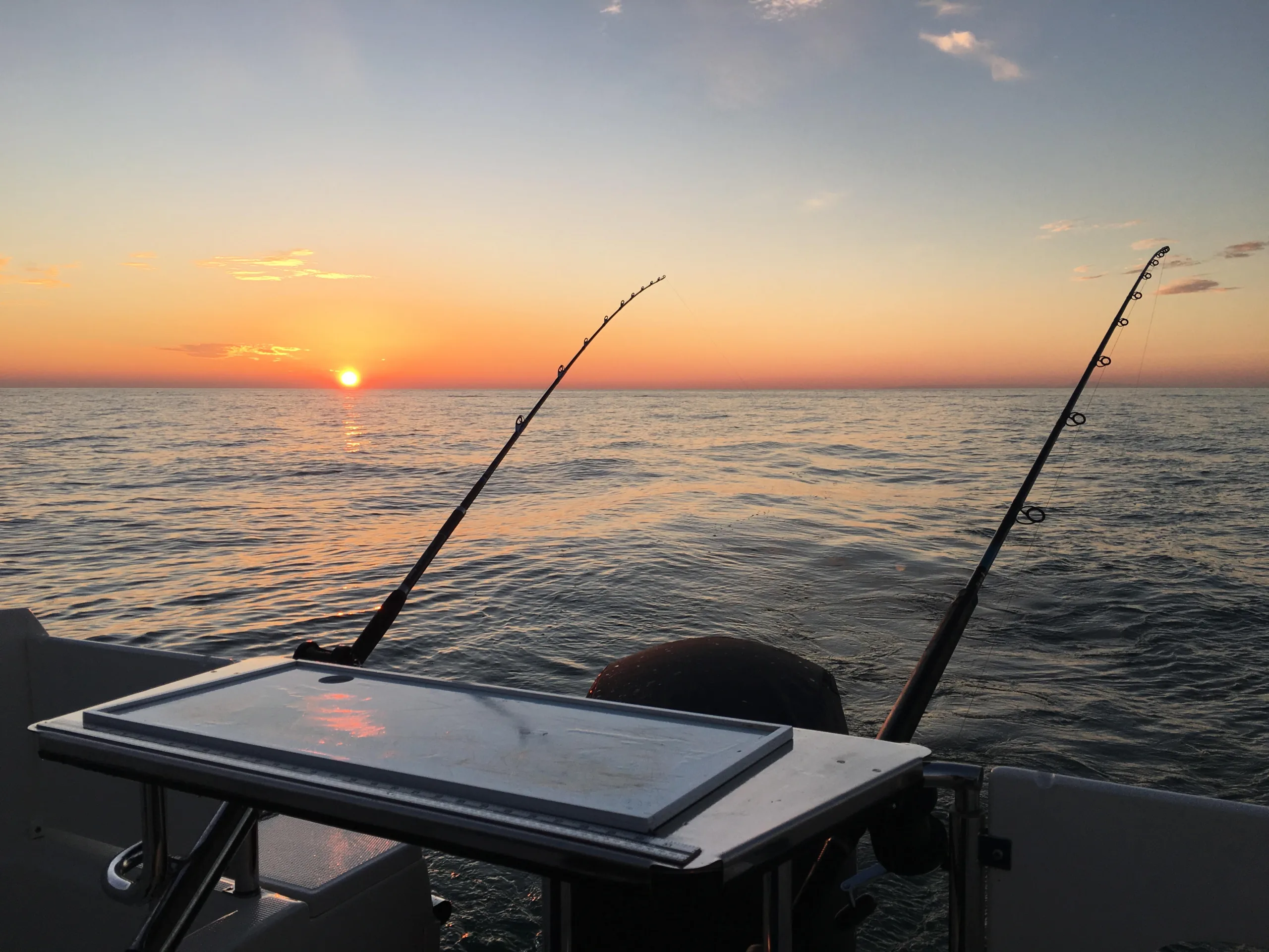 Fishing rods on the Parker 660 Weekend at sunset